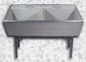 Laundry Sinks made of portland gray cement.
